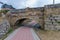Spain.Stone bridge of the street the wall of Cervera de Pisuerga. Palencia