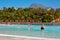 Spain, Tenerife, Adeje - December 18, 2018: People have fun in aqua park. Blue water pool on a sunny day in aqua park. Siam park