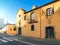 SPAIN, TOSSA DE MAR - JUNE 28, 2019: streets of the old quarter - view of an old house in the lateral rays of the setting sun