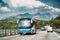 Spain. Touristic Bus Car Goes On Motorway Freeway Highway Road On Background Of Spanish Montserrat Mountain Nature