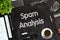 Spam Analysis on Black Chalkboard. 3D Rendering.