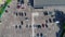 Span over a parking lot with cars, parking near a store top view