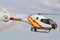 Spanish Air Force Eurocopter EC-120B Colibri helicopter from the Patrulla Aspa display team performing an aerial display.