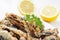 Spanish boquerones fritos, battered and fried anchovies typical