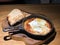 Spanish breakfast baked tomato and organic eggs served with sour dough bread