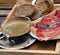 Spanish breakfast â€“ coffee, toasts, jamon