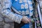 Spanish Bullfighter with blue dress and silver ornaments, the mantle is placed to start the paseÃ­llo