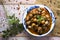 Spanish caracoles en salsa, cooked snails in sauce