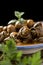 Spanish caracoles en salsa, cooked snails in sauce