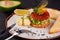 Spanish cuisine, tartarus from red fish, Red caviar and avocado