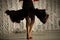 Spanish dance. Black dress. Dancer on stage. Details of speech. Incendiary movement