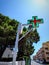 Spanish Farmacia green red cross sign outside chemist pharmacy shop in Empuriabrava Spain