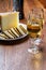 Spanish fino sherry wine from Andalusia and pieces of different sheep hard manchego cheeses made in La Mancha, Spain. Wine and