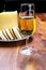 Spanish fino sherry wine from Andalusia and pieces of different sheep hard manchego cheeses made in La Mancha, Spain. Wine and