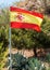 Spanish flag against authentic spanish countryside