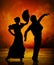 Spanish flamenco dancer couple on fire background