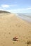 Spanish flip flops in Cuesta Maneli beach in the province of Huelva, Andalusia, Spain