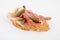 Spanish food tapas.Toast with prosciutto and small gherkins