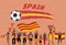 Spanish football fans cheering with Spain flag colors in front o