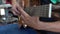 Spanish guitar maker, or luthier, playing a flamenco guitar to test its sound