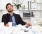 Spanish man is sleeping at desk after productive day