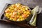 Spanish Potatoes roasted with Garlic Shrimp close-up in a plate. Horizontal