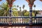 spanish revival tiles on the pillars of a balcony