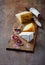 Spanish Salami, Brie and Hard Cheese on a Wooden Board