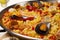 Spanish seafood rice paella, close up