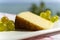 Spanish sheep cheese served with white grapes outside with sea view