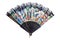 Spanish souvenir. Beautiful colorful traditional spanish fan with black lace rim isolated on a white background