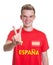 Spanish sports fan with blond hair showing victory sign