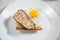 Spanish tapa with egg, pork tenderloin and bread