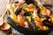 Spanish traditional cuisine: hot paella with seafood shrimps, mu