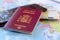 Spanish travel passport on the wallet with euro cash