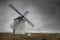 Spanish windmill typical from La Mancha in a cloudy day