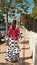 Spanish woman dressed for carnival celebration and walking in Spain