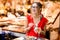 Spanish woman eating jamon at the market