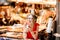 Spanish woman eating jamon at the market