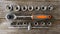 Spanner head and power wrench on a wooden table in the workshop