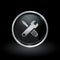 Spanner and screwdriver icon inside round silver and black emblem