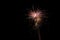 Sparking fireworks against a black night sky, brings joy to people but panic and fear to animals, copy space