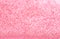 Sparkle pink blured shiny glitter texture background .