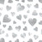 Sparkle seamless pattern with holographic silver glitter hearts on white background