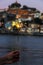 A sparkler with blurred city landscape of Porto