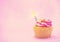 Sparkler on a cupcake pink background