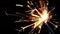 Sparkler fireworks burning on a black background, congratulations, greetings, party, happy new year