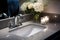 sparkling clean bathroom sink and faucet