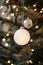 Sparkling Festive Morning with White Christmas Ornament and Twinkling Tree Lights