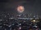 Sparkling firework bursting above Kuala Lumpur and Petaling Jaya (Malaysia)